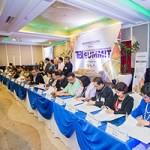 Heads of 20 higher education institutions, including Chancellor Sylvia Concepcion of UP Mindanao, sign a memorandum of understanding under the HEIRIT Program, at the First Philippine TBI Summit, held in Cebu City, November 24, 2017.