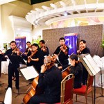 Some members of the Philippine Philharmonic Orchestra play excerpts from Vivaldi and Mozart compositions. (Photo by Bong Arboleda, UP MPRO)