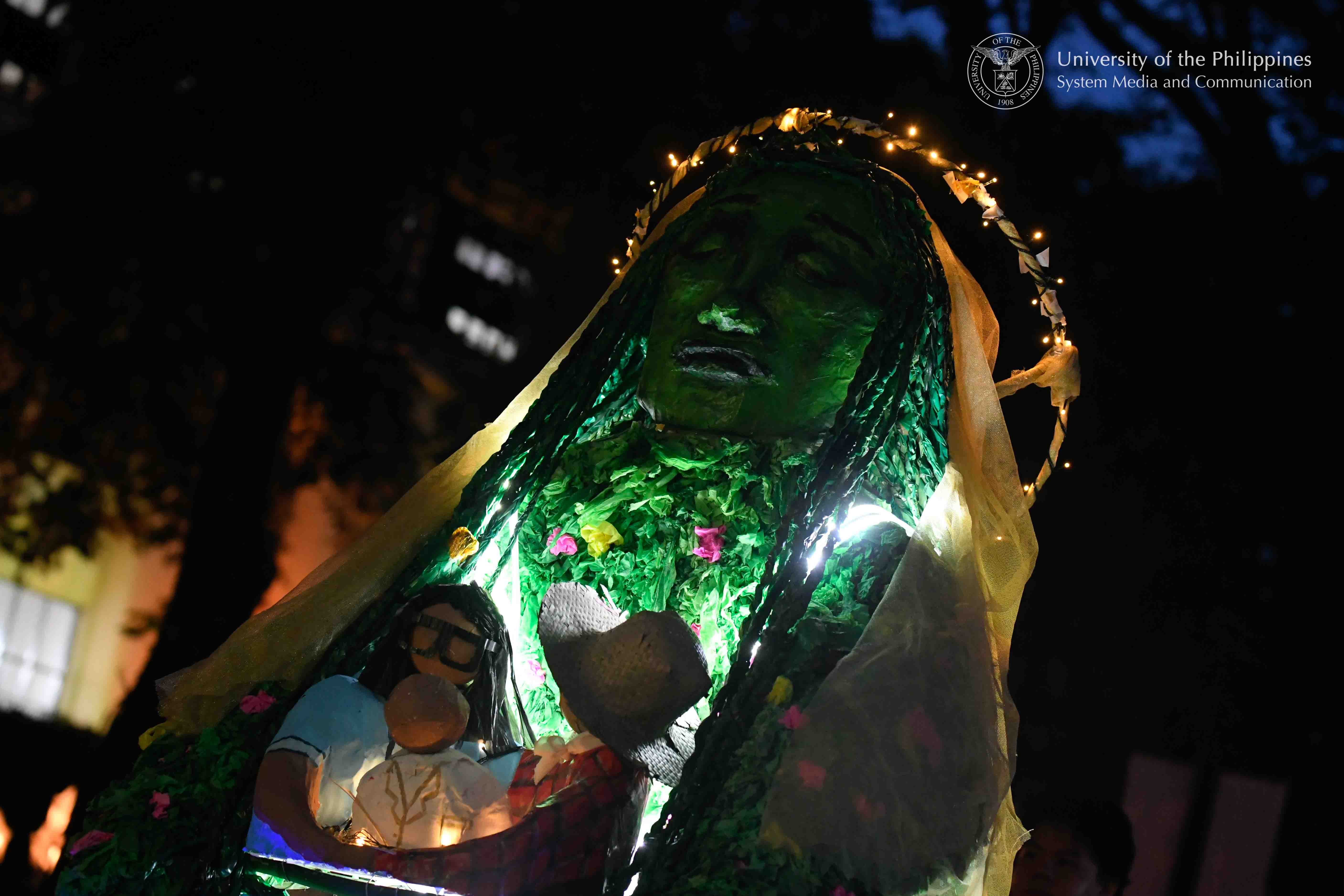 The lantern of the UP Manila College of Medicine, which depicts the Sierra Madre as a maternal protector of the people, joins the Lantern Parade in UP Diliman. Photo by Kevin Roque, UPS-MCO.