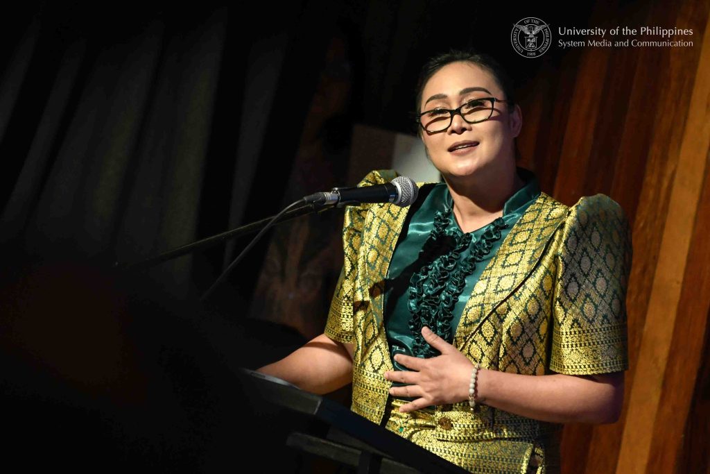 Maria Socorro Ester Paluga, general manager of the Valencia City Water District in Bukidnon, delivers the learners’ address for the graduates of the professional course on water governance. Photo by Kevin Roque, UPS-MCO.