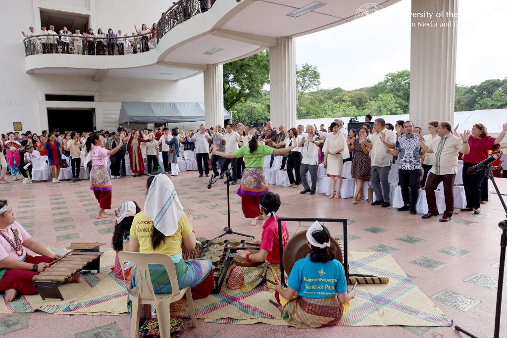 Officials of the UP System and UP Diliman learn the steps of an indigenous dance, led by Kontra-GaPi.
Photo by Bong Arboleda, UPS-MCO.