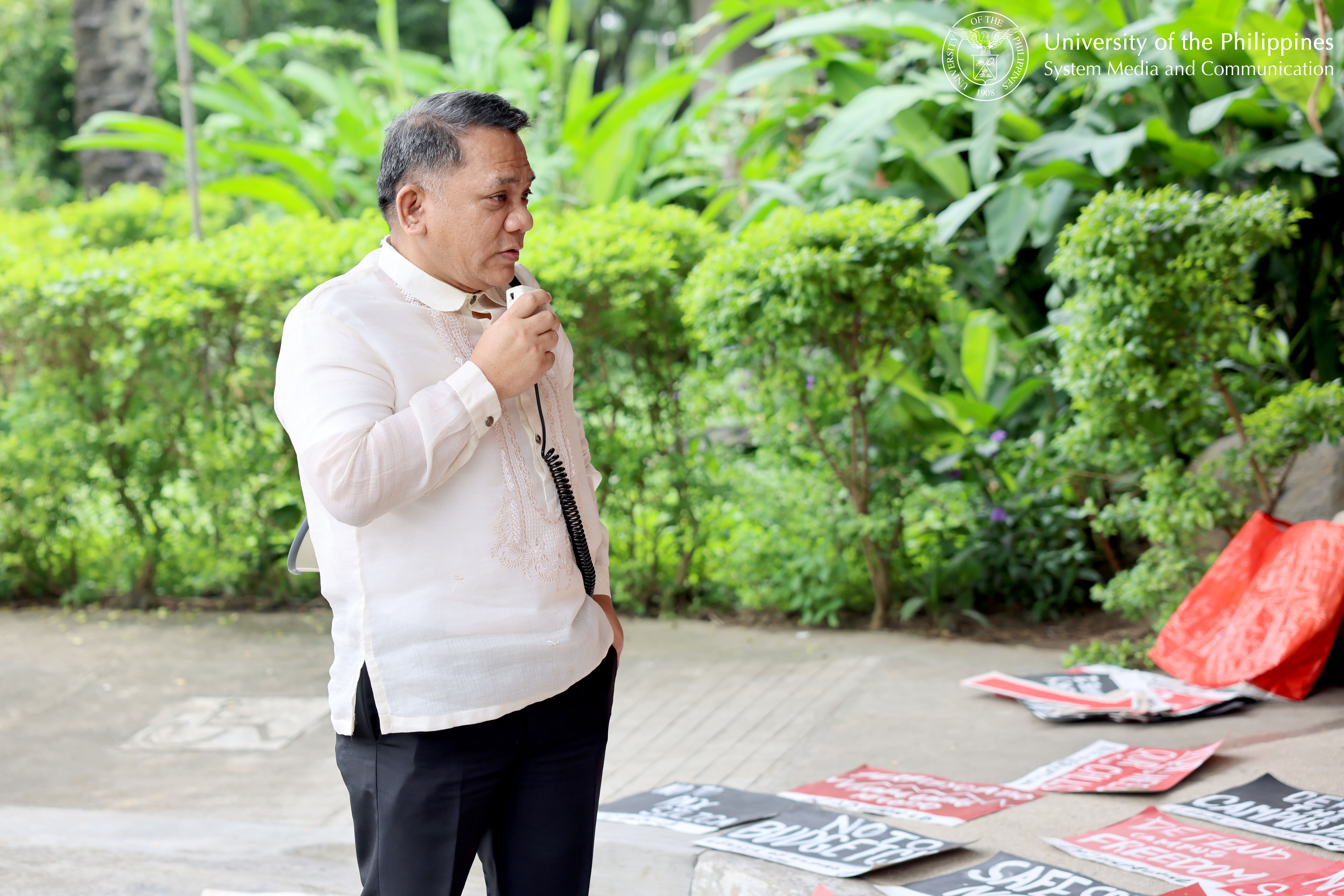 Reappointed UP Los Baños Chancellor Jose Camacho Jr. addresses the UPLB contingent that joined the multisectoral mobilization at the Asian Institute of Tourism, UP Diliman.
Photo by Bong Arboleda, UPS-MCO.
